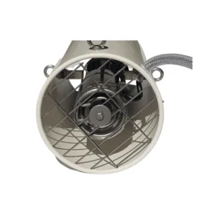 Industrial ventilator fan with metal grille.