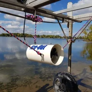 Ice-Out device on dock by a lake.