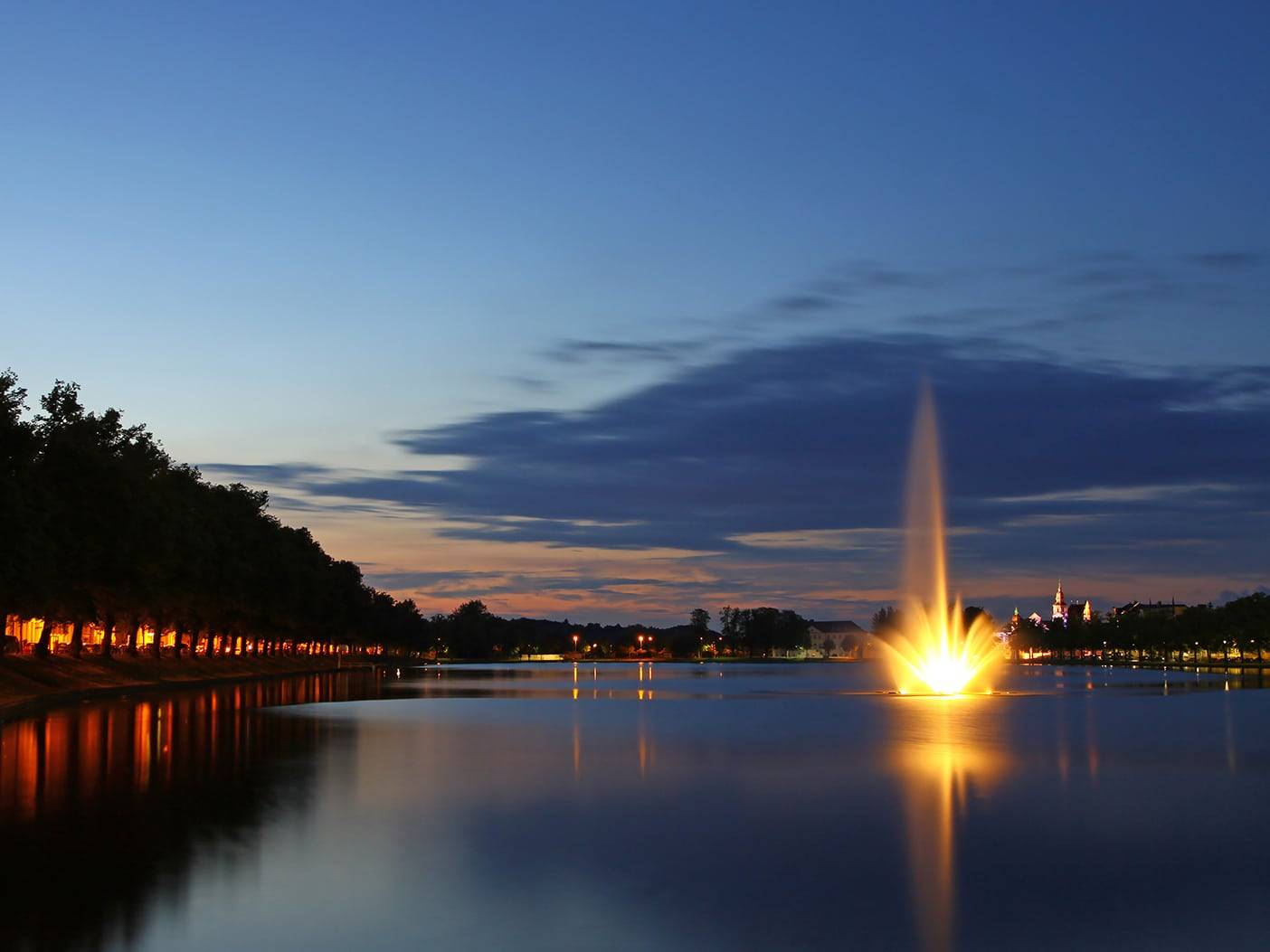 Panoramic view of Pfaffenteich lake and Schwerin city at evening, Mecklenburg-Vorpommern region, Germany